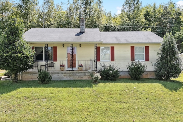 ranch-style home with a front yard