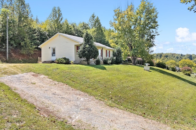 exterior space with a front lawn