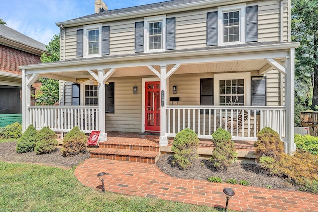 view of front of property featuring covered porch