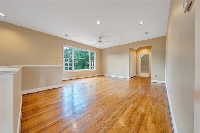 interior space with ceiling fan and light wood-type flooring