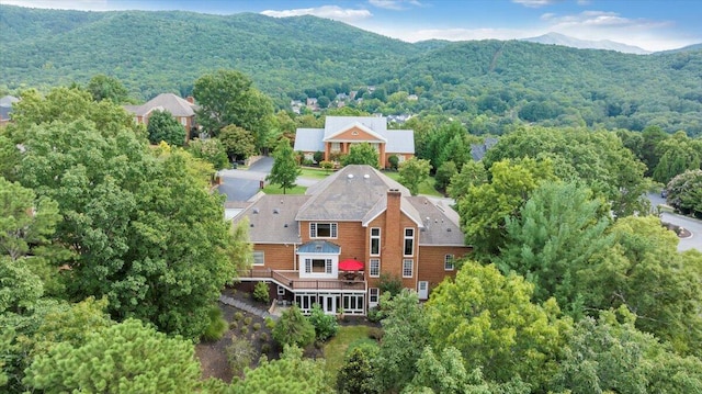 birds eye view of property featuring a mountain view