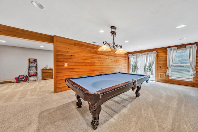 rec room with wood walls, billiards, and light carpet