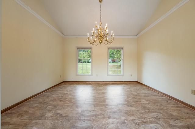 spare room with crown molding, an inviting chandelier, and tile patterned floors