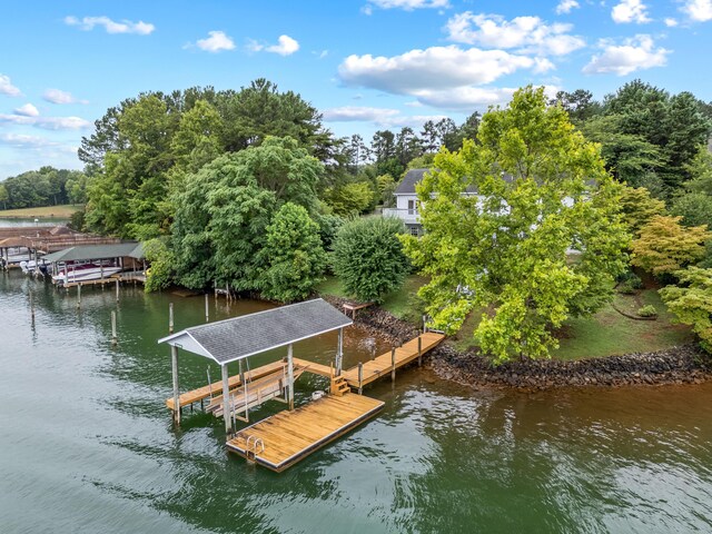 dock area featuring a water view