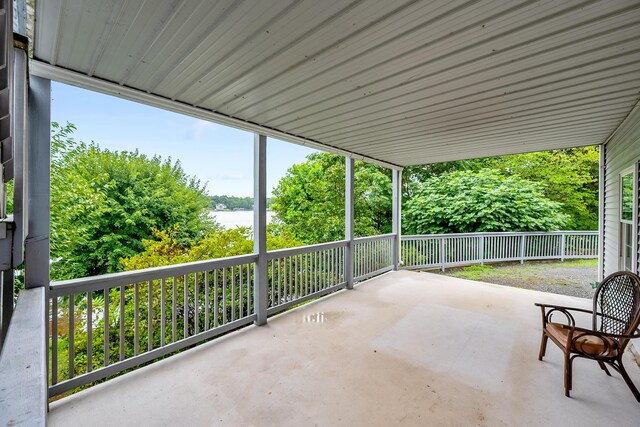 view of patio / terrace featuring a water view