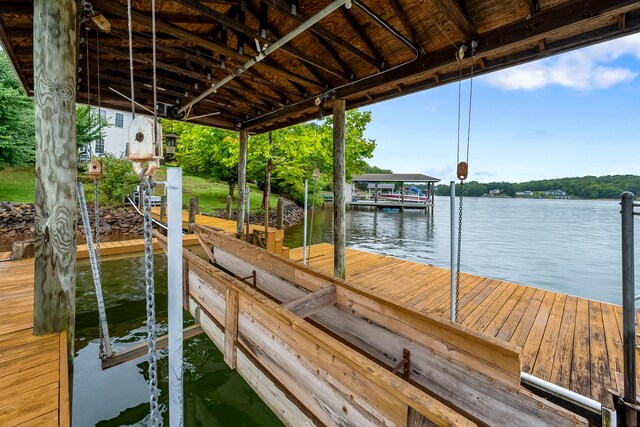 dock area featuring a water view