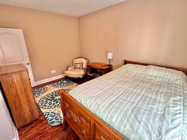 bedroom featuring hardwood / wood-style flooring