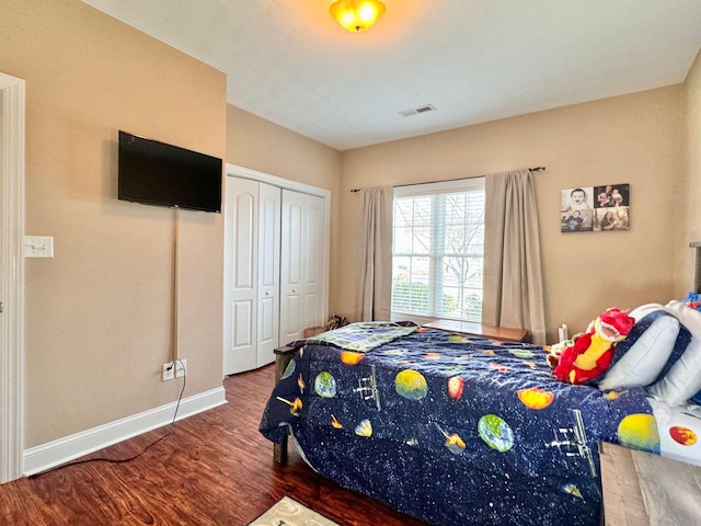 bedroom featuring a closet and hardwood / wood-style floors