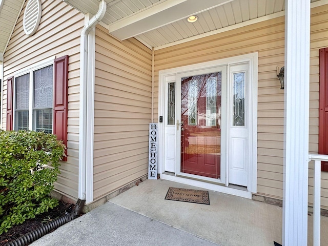 doorway to property with a porch