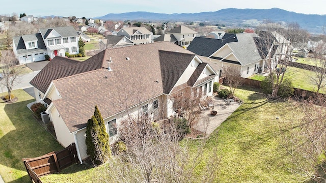 drone / aerial view featuring a mountain view