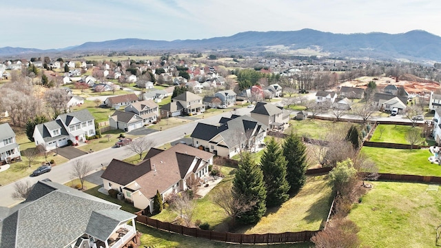 birds eye view of property featuring a mountain view