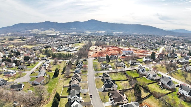 drone / aerial view featuring a mountain view