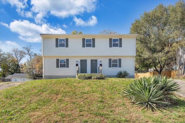 view of front facade with a front lawn