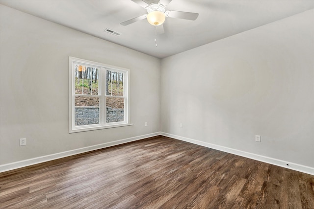 spare room featuring ceiling fan and wood-type flooring