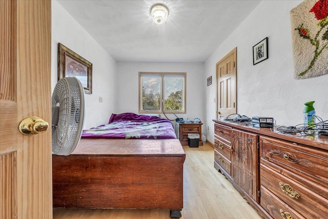 bedroom with light wood-type flooring