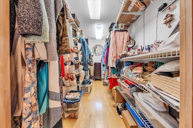 walk in closet featuring hardwood / wood-style flooring