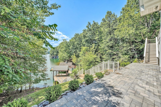 view of patio / terrace featuring a water view