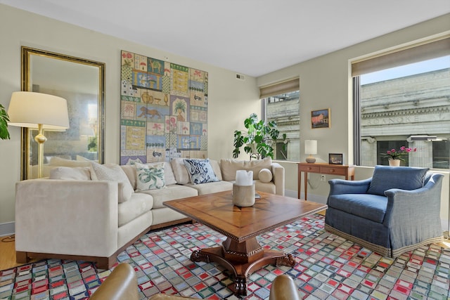 living room featuring a fireplace