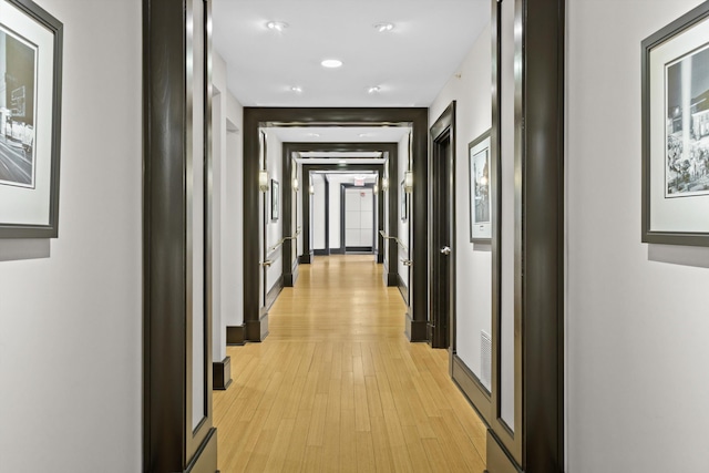 corridor featuring light wood-type flooring