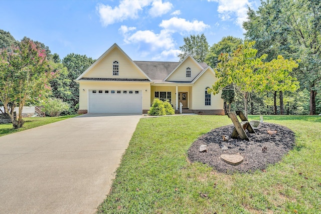 view of front of property featuring a front lawn and a garage