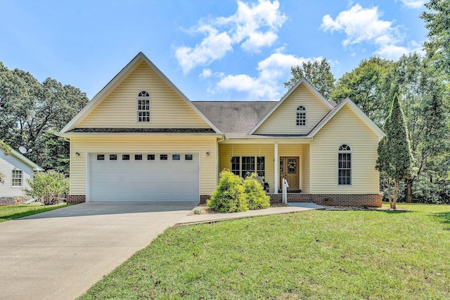 view of front of home with a garage, a front lawn, and covered porch