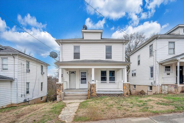 view of front property with covered porch