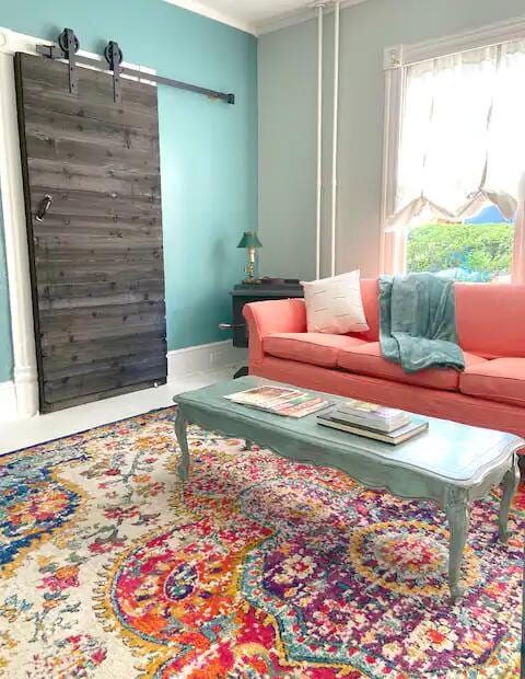 living room featuring a barn door