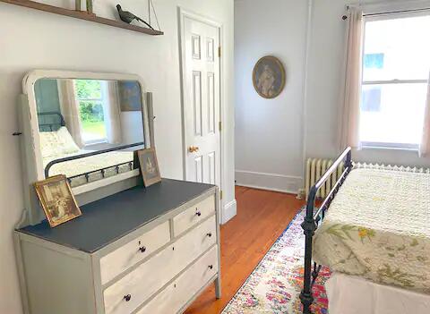 bedroom with wood-type flooring