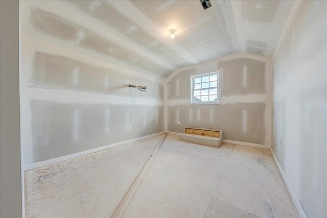 bonus room with vaulted ceiling