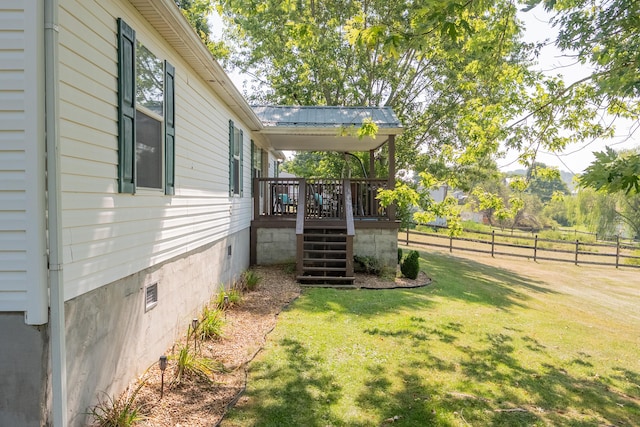 view of yard with a deck