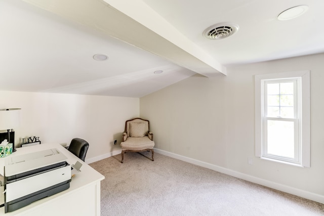 carpeted office with lofted ceiling with beams