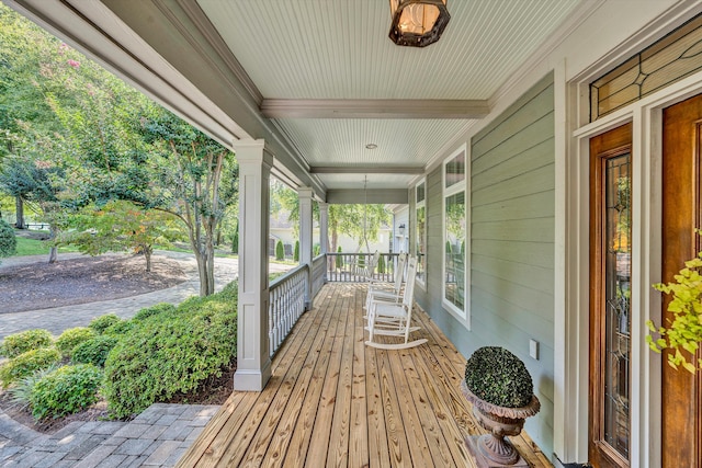 wooden deck featuring a porch