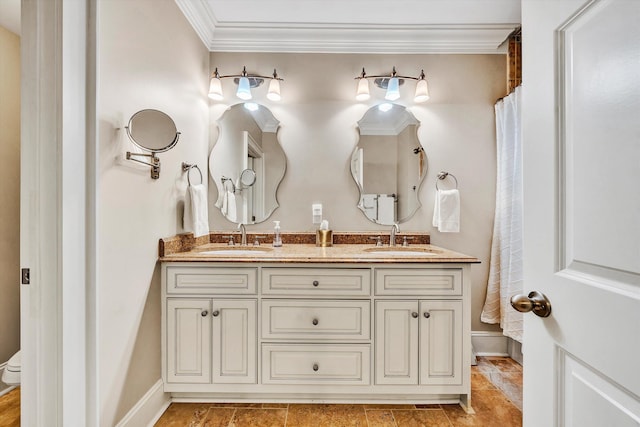 bathroom with vanity, a shower with shower curtain, and ornamental molding