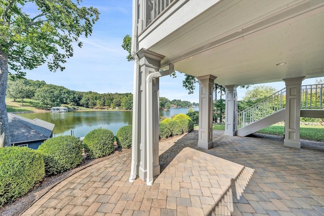 view of patio / terrace featuring a water view