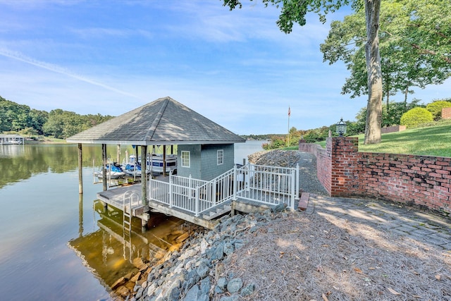 dock area featuring a water view