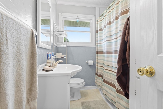 bathroom with vanity, tile patterned flooring, a shower with shower curtain, toilet, and ornamental molding