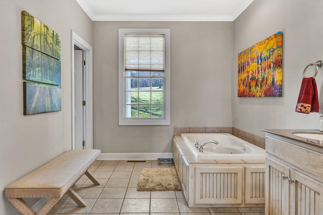 bathroom with crown molding, vanity, tile patterned floors, and a washtub