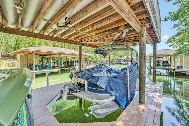 dock area with a water view