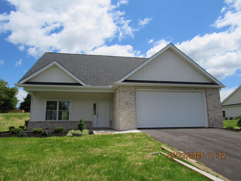 5530 New Pleasant Way, Salem, VA 24153 - ranch-style home featuring brick siding, driveway, a shingled roof, an attached garage, and a front yard