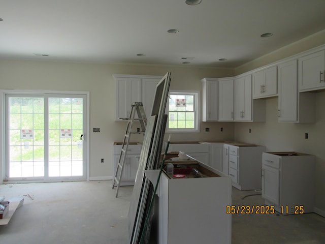 5530 New Pleasant Way, Salem, VA 24153 - kitchen with a kitchen island, white cabinetry, and baseboards