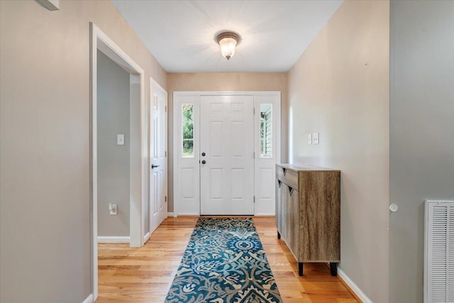 foyer entrance featuring light hardwood / wood-style floors