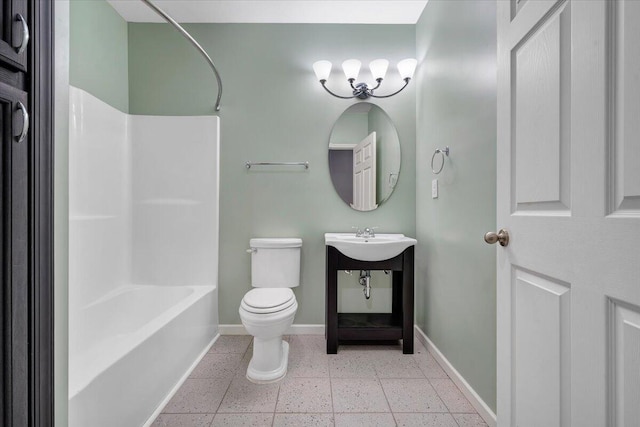 bathroom with shower / bathing tub combination and toilet