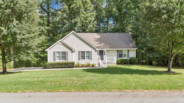 view of front facade with a front yard and a porch