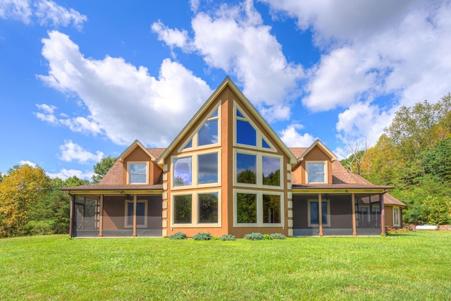 1782 Wolf Creek Rd, Narrows, VA 24124 - rear view of house with a sunroom and a lawn