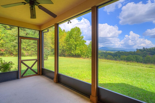 1782 Wolf Creek Rd, Narrows, VA 24124 - unfurnished sunroom featuring ceiling fan