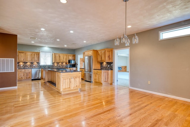 1782 Wolf Creek Rd, Narrows, VA 24124 - kitchen with appliances with stainless steel finishes, dark countertops, plenty of natural light, backsplash, and recessed lighting