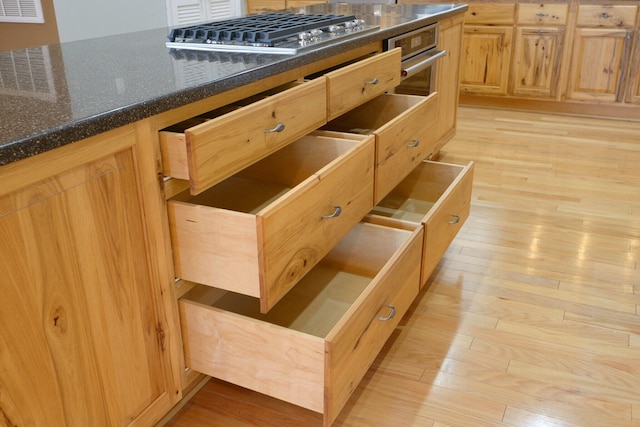 1782 Wolf Creek Rd, Narrows, VA 24124 - kitchen view of light wood finished floors and stainless steel gas cooktop