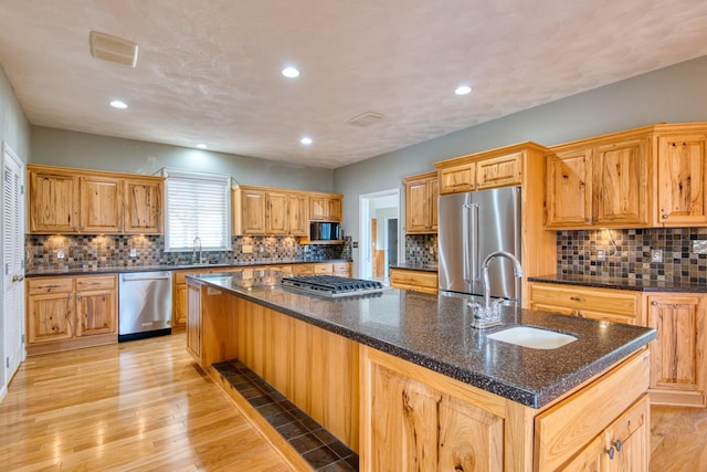 1782 Wolf Creek Rd, Narrows, VA 24124 - kitchen featuring appliances with stainless steel finishes, a sink, a spacious island, tasteful backsplash, and recessed lighting