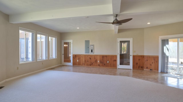 1782 Wolf Creek Rd, Narrows, VA 24124 - carpeted spare room featuring wood walls, wainscoting, a ceiling fan, recessed lighting, and baseboards