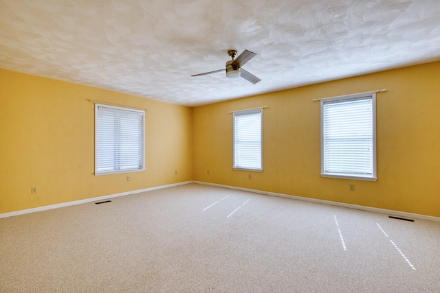 1782 Wolf Creek Rd, Narrows, VA 24124 - carpeted empty room with ceiling fan, baseboards, and a textured ceiling
